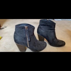 Heeled grey zip-up booties